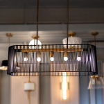 Люстра подвесная овальной формы с металлическим решетчатым абажуром матово-черного цвета и 5 лампами Kichler варинант исполнения - 7 | Loft Concept в Твери